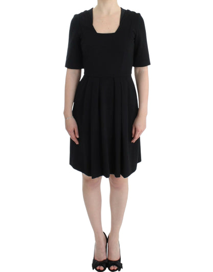 CO|TE Black short sleeve venus dress