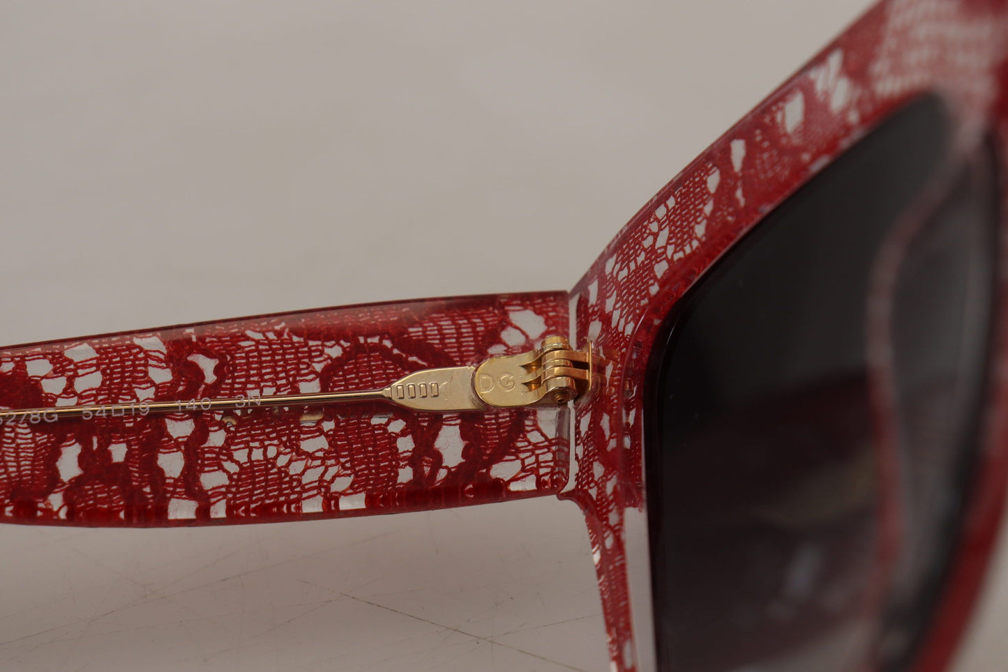 Dolce & Gabbana Elegant Lace-Infused Red Sunglasses