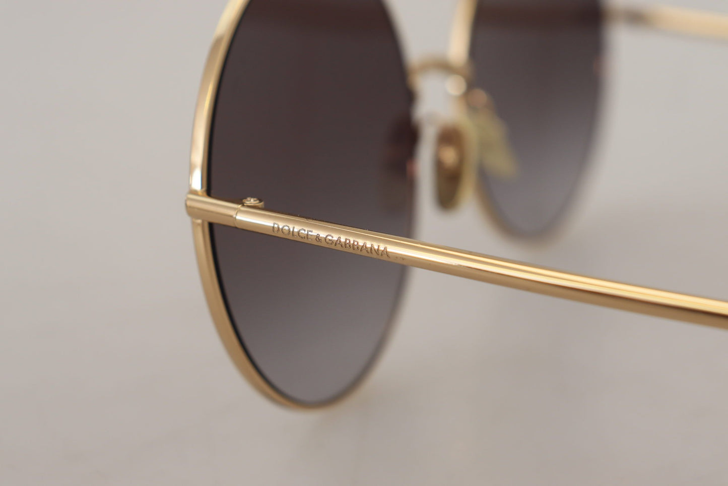 Dolce & Gabbana Elegant Black Gold Gradient Sunglasses